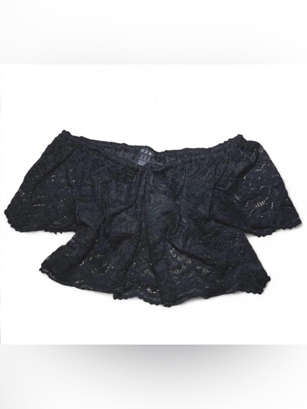 Black lace off-the-shoulder crop-top with ruffle trim.